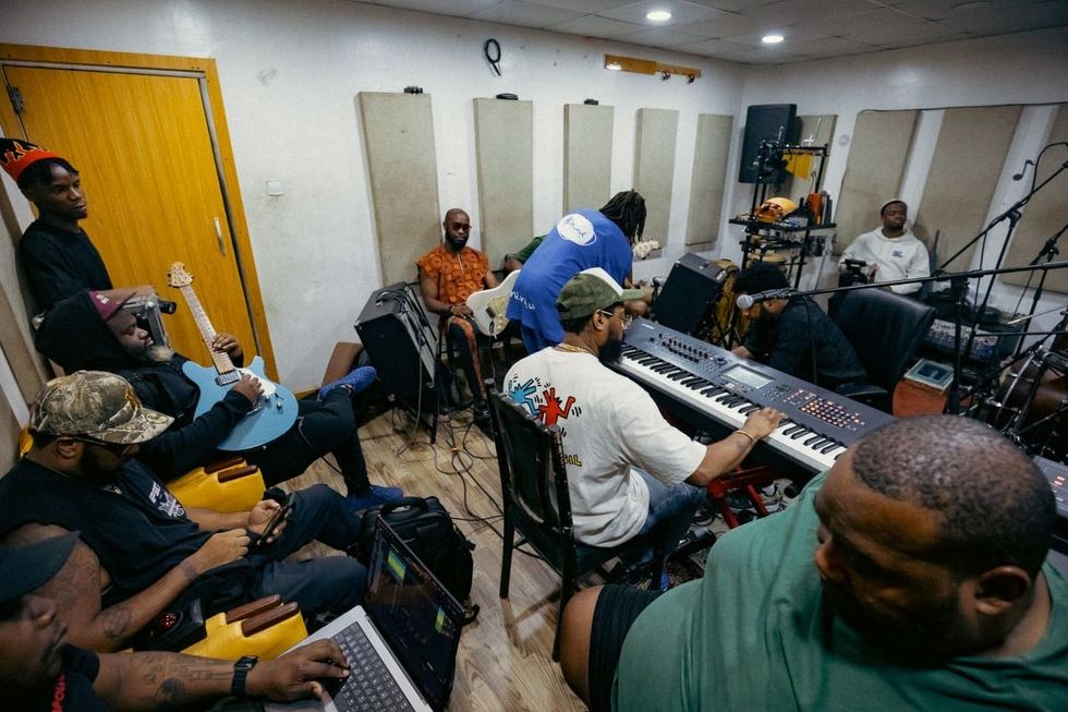 A photo of PJ Morton and his team working in a Lagos studio.